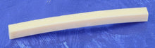 Load image into Gallery viewer, Genuine Fender New Old Stock '80s "Bone" Nut Blank 7.25" Radius 2.008" Wide '80s - Bone Colored Molded Plastic