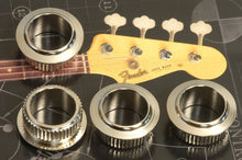 Load image into Gallery viewer, Fender USA Vintage Nickel Bass Tuner Headstock Bushings, Set of 4, 0019509049