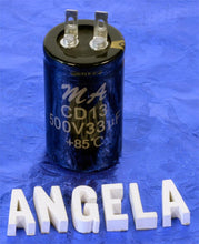 Load image into Gallery viewer, M&A 33uF 500VDC Polarized Electrolytic Clamp Mount Can Cap For Amps